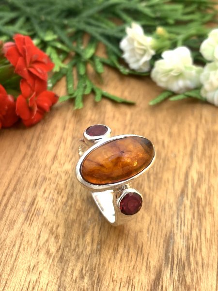 Amber Ring with Garnet